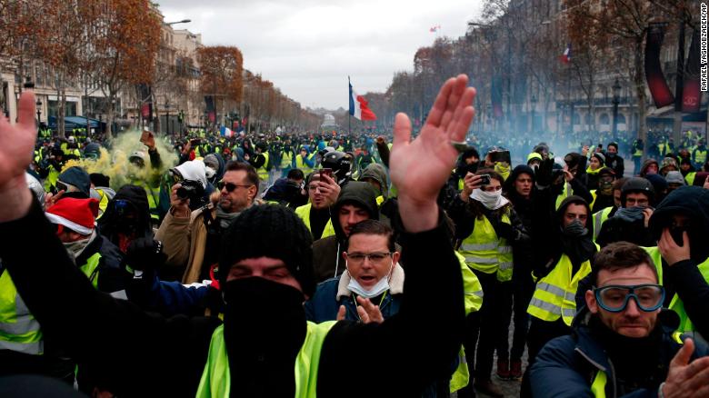 France 'gilets jaunes' protesters detained and tear-gassed