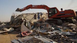 Beijing forces migrant workers from their homes in 'savage' demolitions