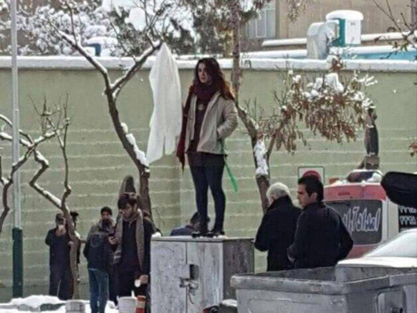 Iranian women take off headscarves to protest veil law