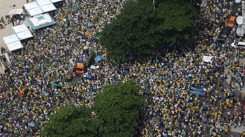 Protesters demand President's ouster in Brazil, decry corruption.