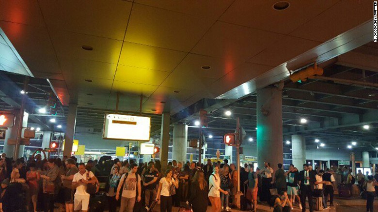 JFK terminal evacuated after report of shots fired
