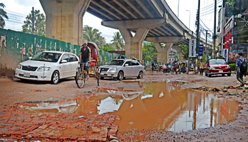 Potholes put Ctg city dwellers to sufferings