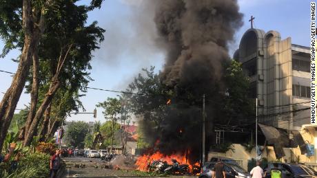 Family of suicide bombers attacks 3 churches in Indonesia, killing 7, police say