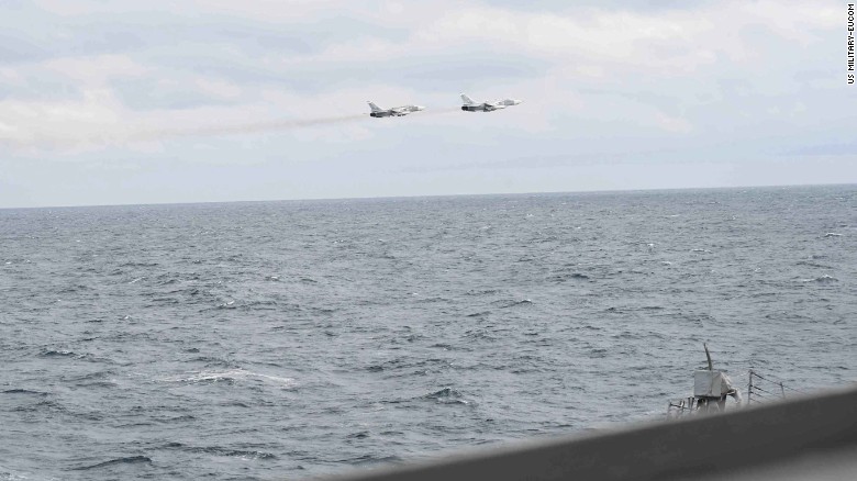 Russian fighter jets 'buzz' US warship in Black Sea, photos show