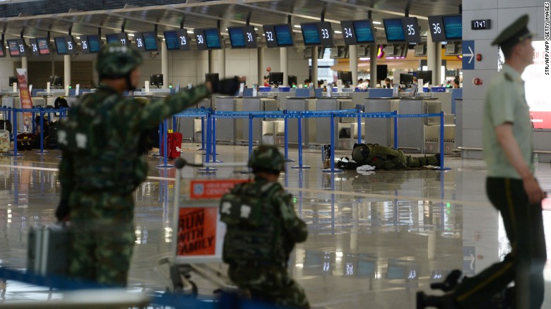 Man hurls explosive device at Shanghai airport, then attempts suicide
