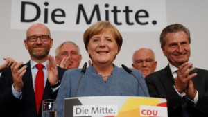 Merkel gets a fourth term but German voters deliver far-right surge