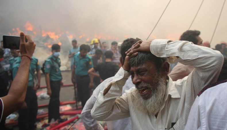 Shahidul, Moinuddin watch their businesses turn into ashes
