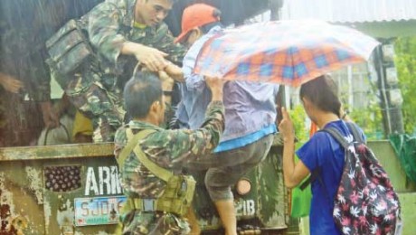 More than 730,000 evacuated as Typhoon Melor batters Philippines