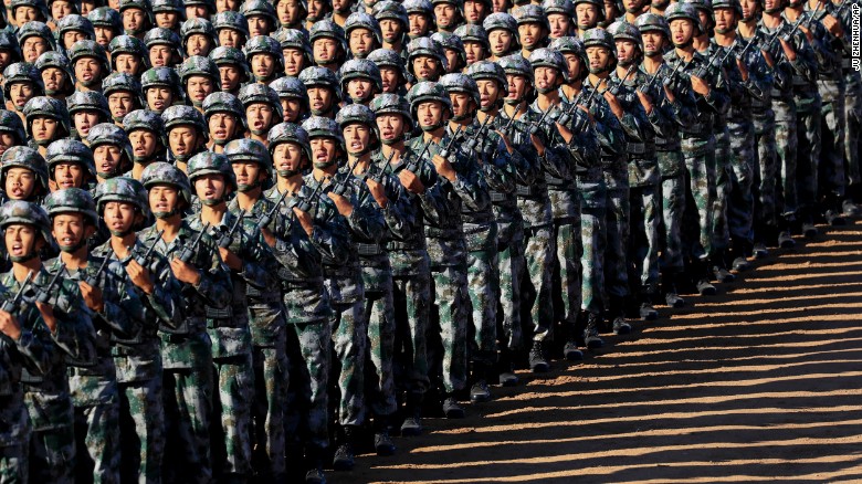 China shows off newest weapons in huge military parade