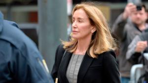 Actress Felicity Huffman cries as she pleads guilty in college admissions scandal