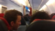  Unruly Delta passenger tried to open exit door in flight, complaint alleges