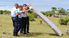 MH370: Amid wait for plane part analysis, islanders search for more debris