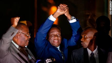 Zimbabwe's Mnangagwa returns to lead nation into 'new democracy'