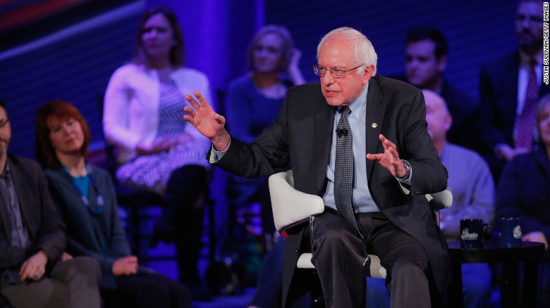 Poll: Clinton tops Sanders, but lead shrinks