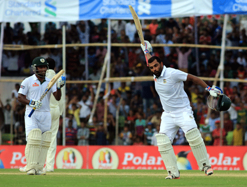 Grieving Tamim hits record ton
