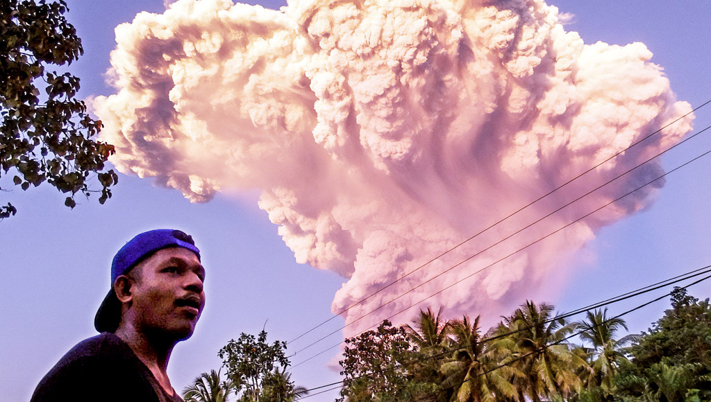 Indonesia volcano spews colossal ash tower