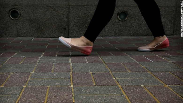 Sidewalk glued down as top Chinese official visits Hong Kong
