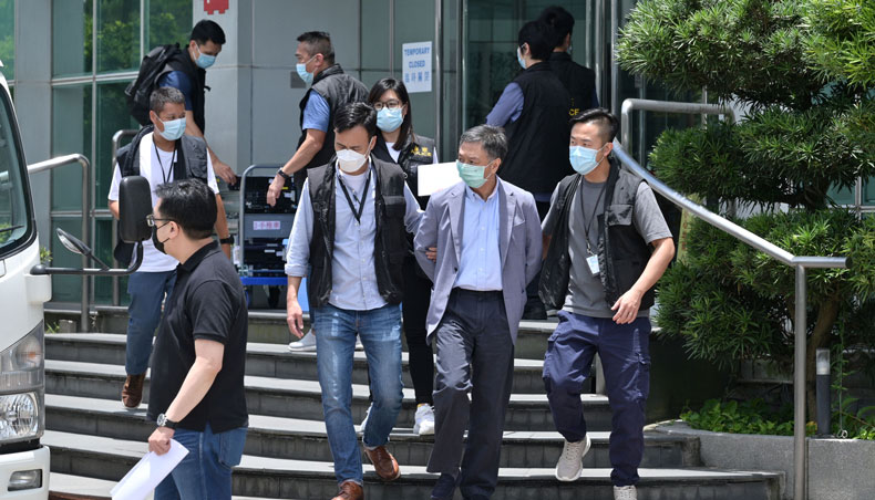 Hong Kong police arrest five of newspaper Apple Daily