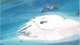 China lands more planes on man-made island in South China Sea