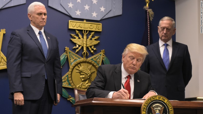 Trump signs executive order to keep out 'radical Islamic terrorists'