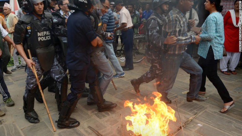 Protesters in western Nepal kill police with spears, axes