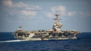 Sailors who had returned to pandemic-stricken aircraft carrier retest positive for coronavirus