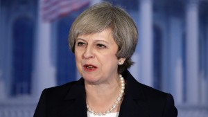 British PM May: Praise for Trump -- but strong words, too