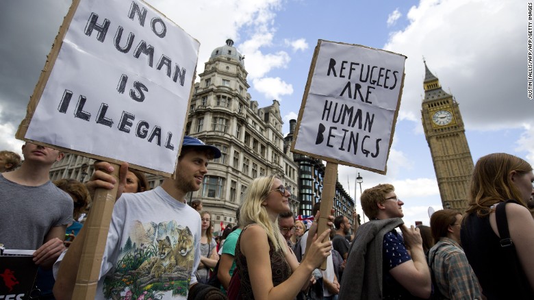 Marchers show support for refugees in solidarity events across Europe