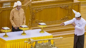 Myanmar swears in new president, ending 56 years of military rule