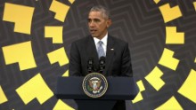 Obama offers 'wait and see' approach to Trump, but adds he'll be watching