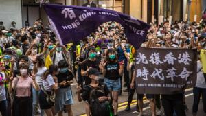 Defiance and fear as Hong Kong settles into new normal after China-backed law takes hold 