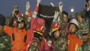 Survivor pulled from the rubble days after deadly China landslide